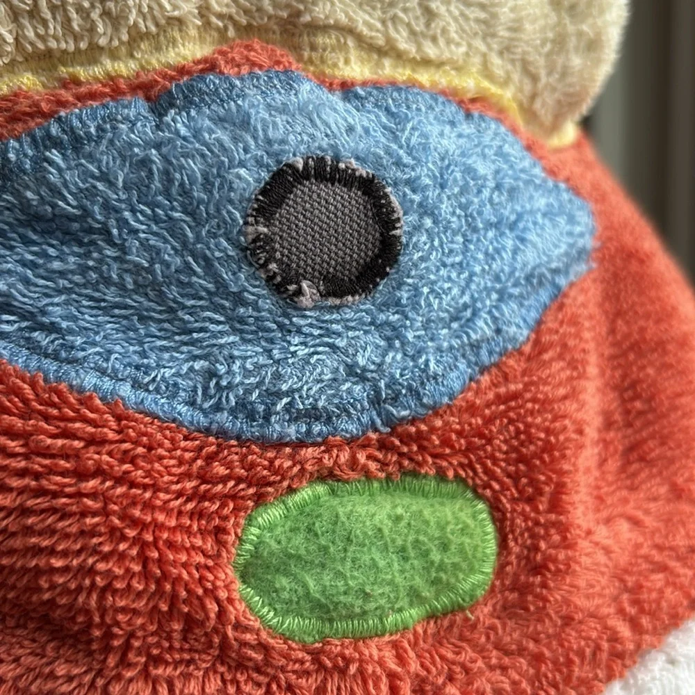 Cyclops / Silly Monster hooded towel in orange, yellow, blue, green, & white